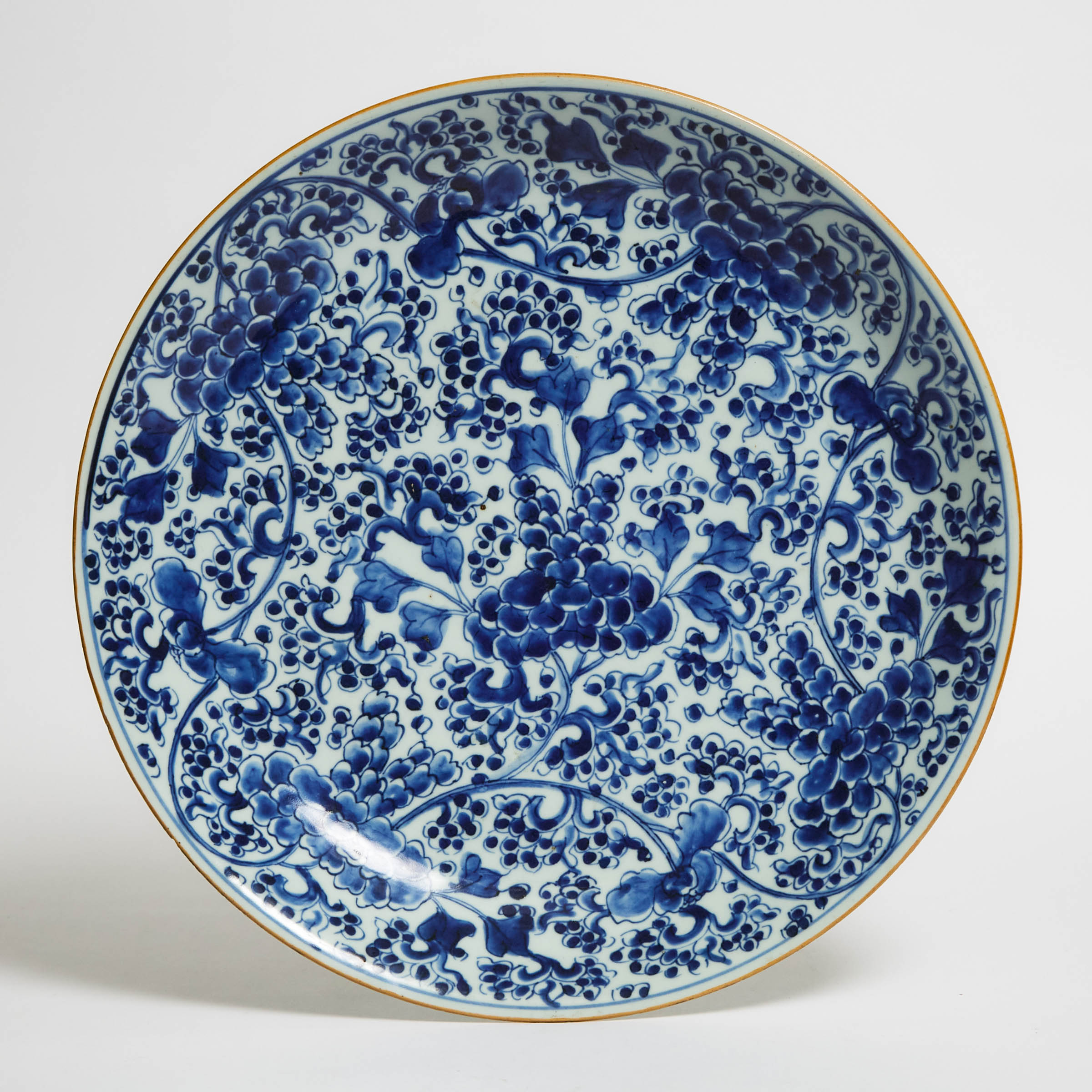 A Blue and White 'Peony' Charger, Kangxi Period (1662-1722)