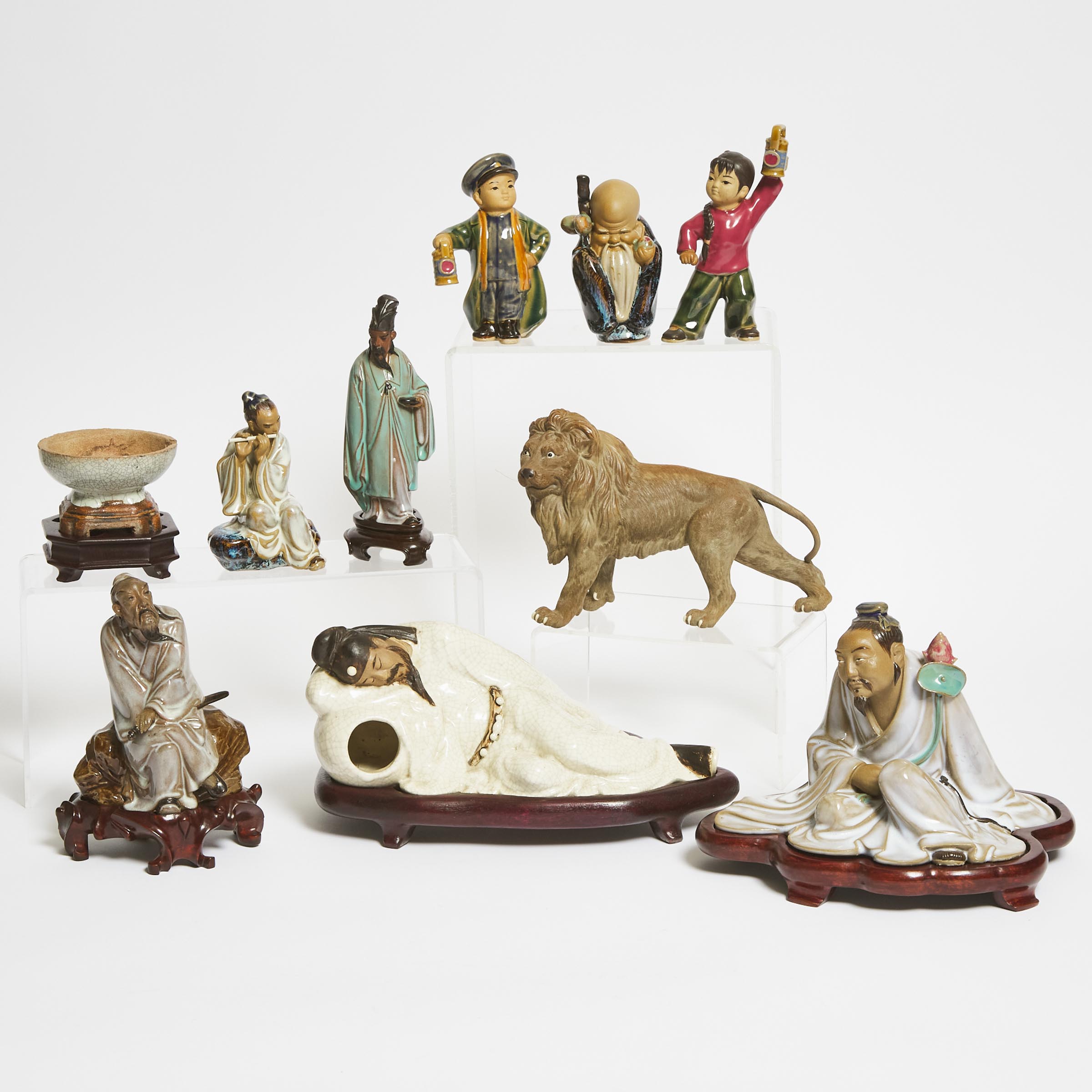 A Group of Ten Shiwan Pottery Figures and Wares, 20th Century