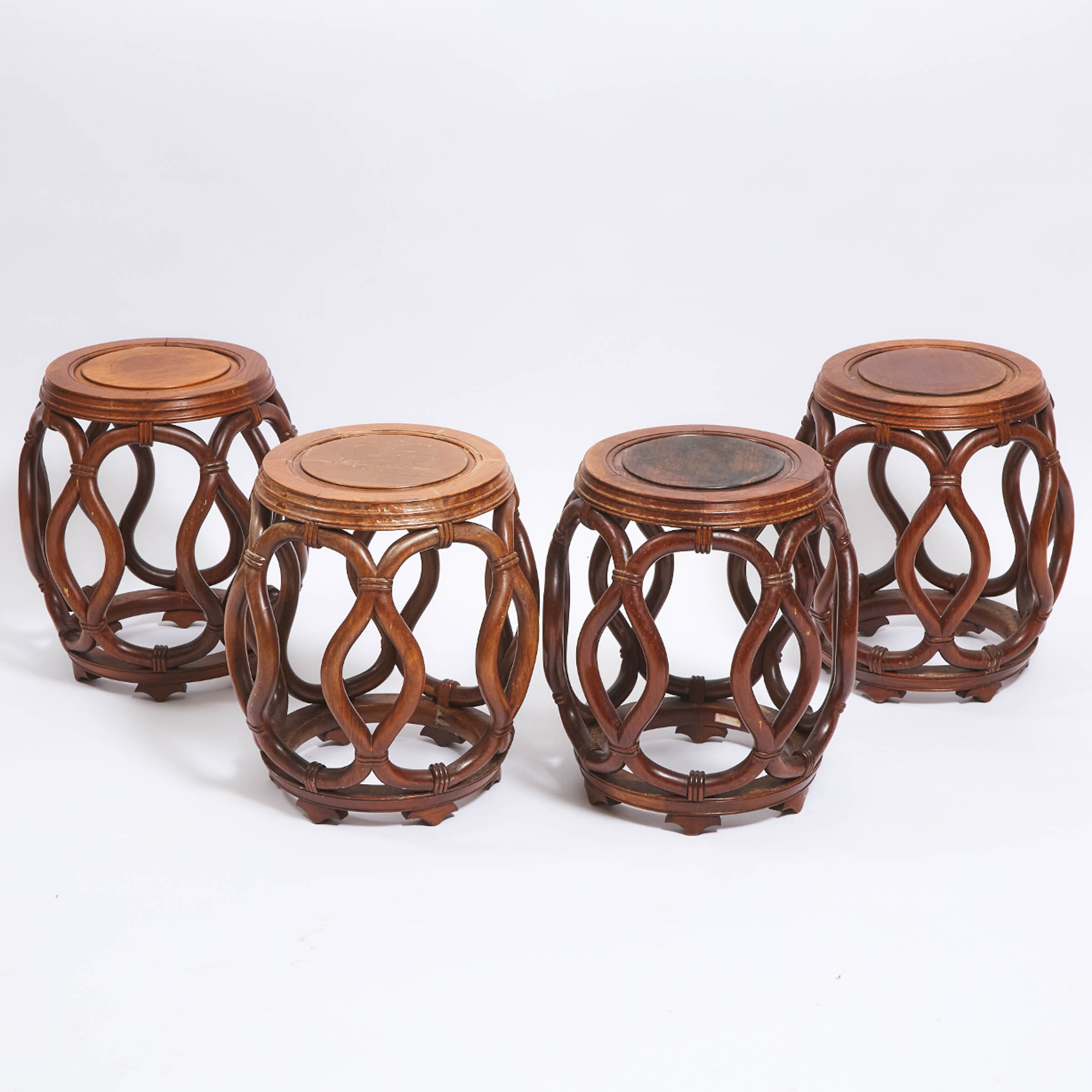 A Set of Four Chinese Ming-Style Hardwood Barrel Stools, Republican Period (1912-1949)