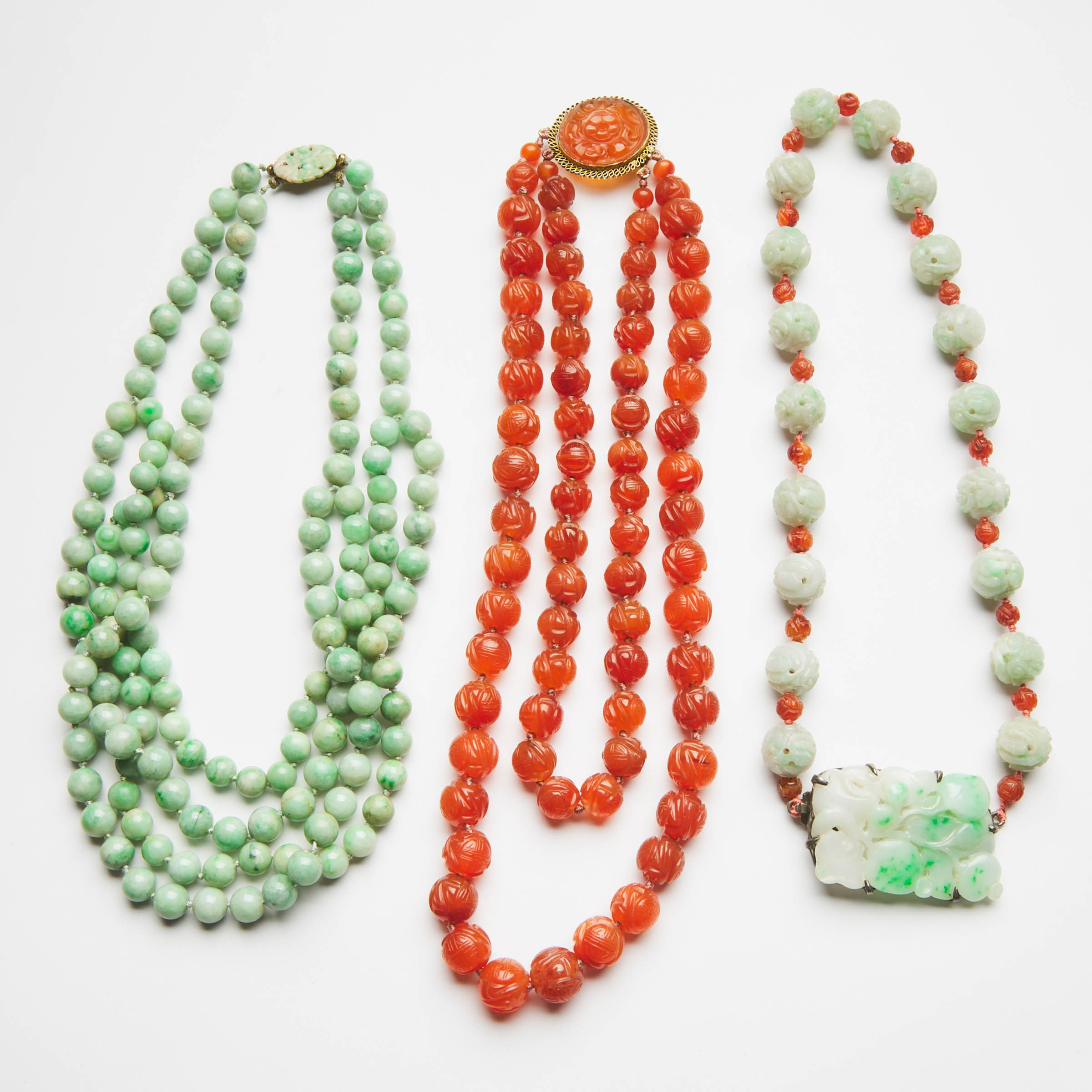 Three Jadeite and Carnelian Necklaces, 19th/20th Century