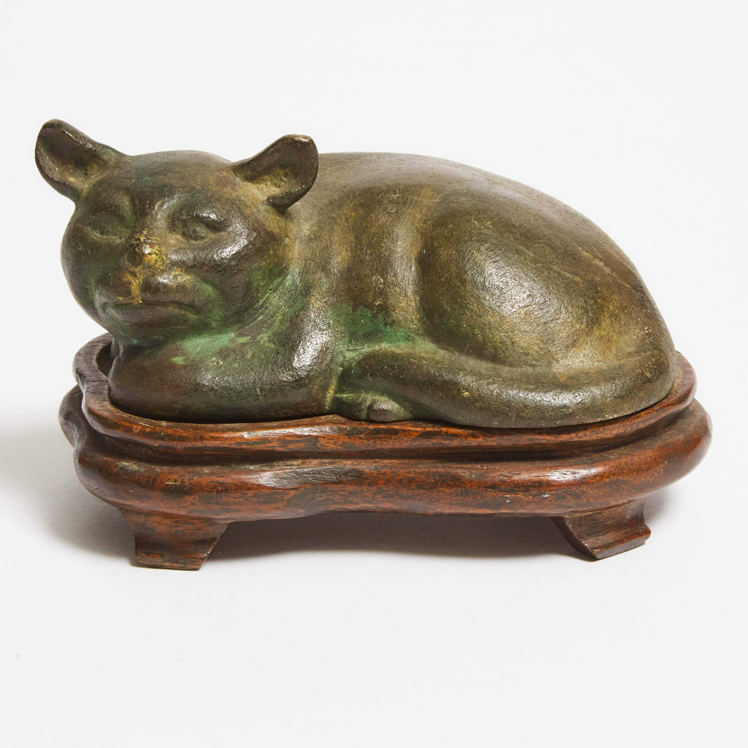 A Japanese Bronze Model of a Recumbent Cat, 19th Century