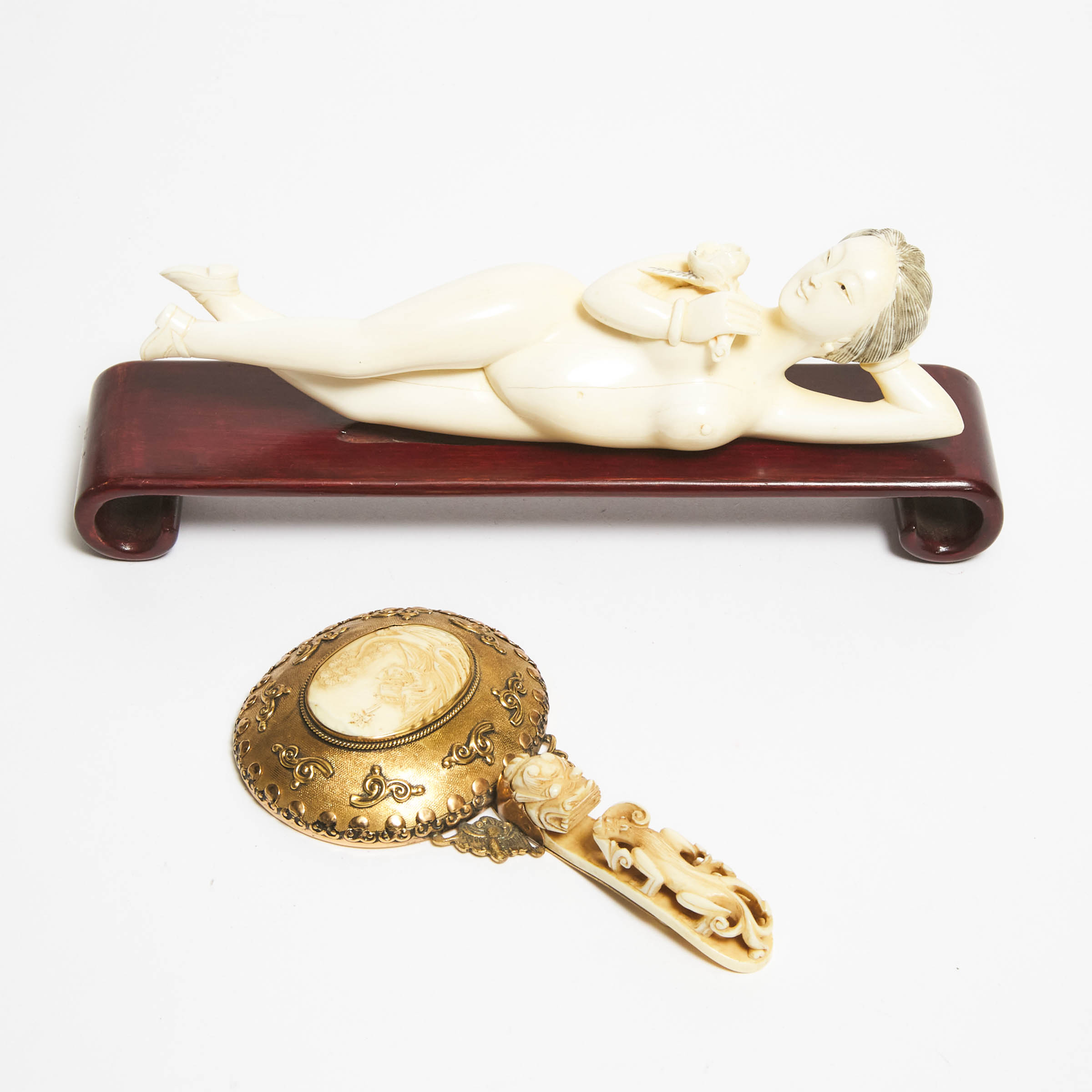 An Ivory Belt Hook Mounted Mirror, Together With a 'Doctor's Doll', Qing Dynasty