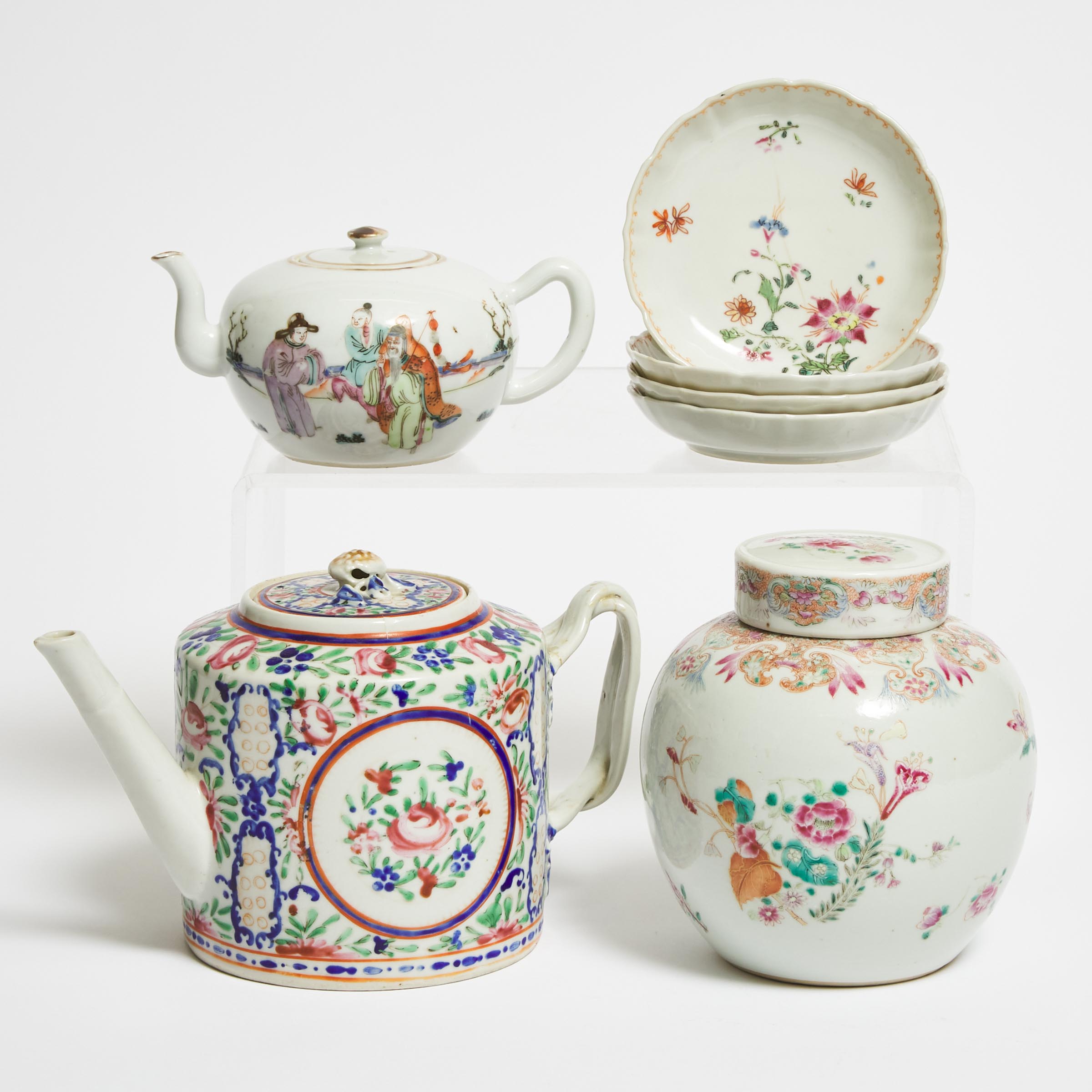 A Group of Seven Famille Rose Teapots, Jar, and Dishes, 18th/19th Century
