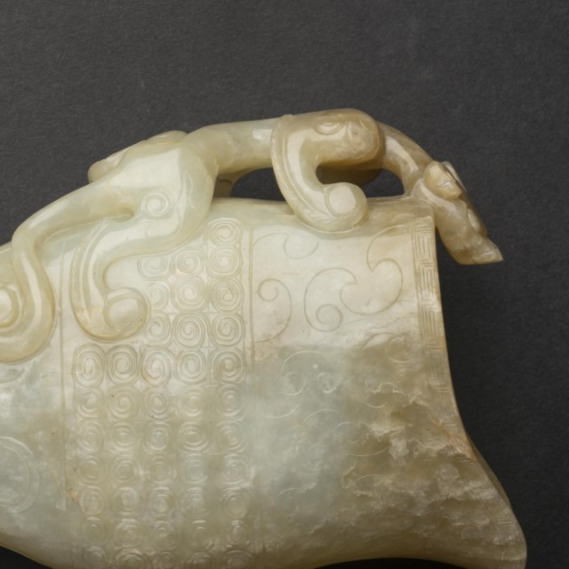 A Finely Carved White and Brownish-Yellow Russet Jade Rhyton (Gong), Song/Yuan Dynasty (960-1368)