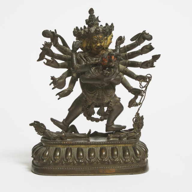 An Imperial Parcel Gilt Copper Alloy Figure of Chakrasamvara and Vajravarahi, Qianlong Mark and Period (1736-1795)