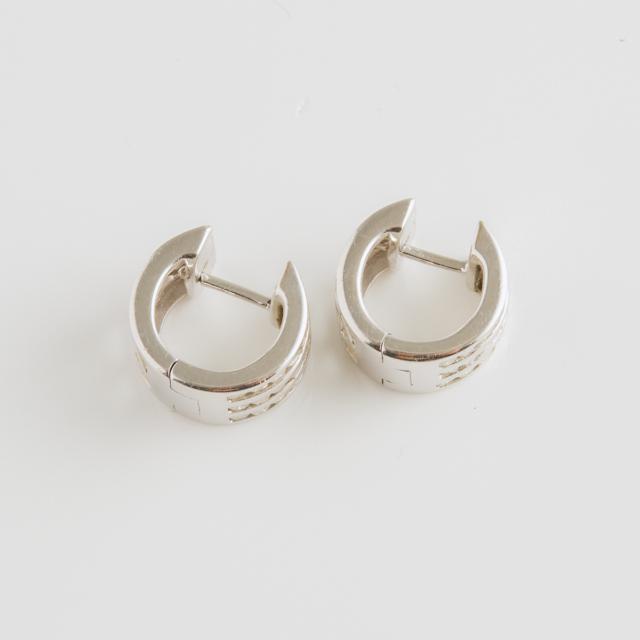 Pair Of 14k White Gold Hinged Huggie Earrings