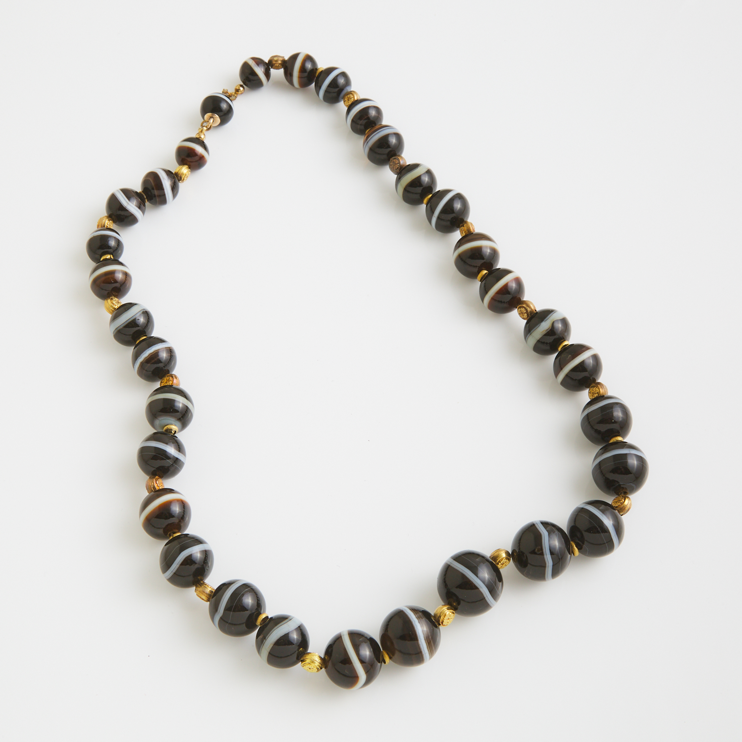 Single Graduated Strand Of Banded Agate Beads