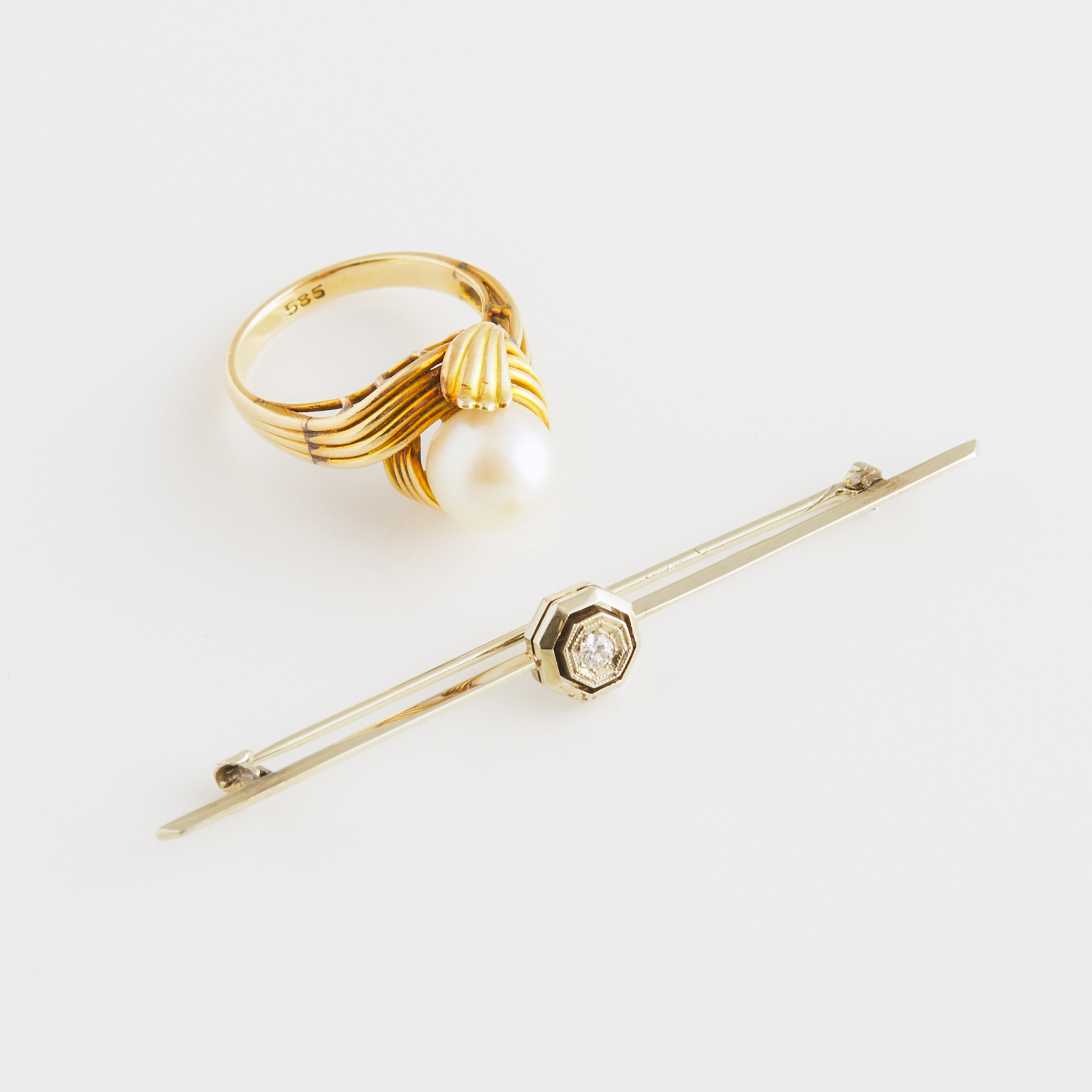 14k Yellow Gold Ring And An 18k White Gold Bar Pin