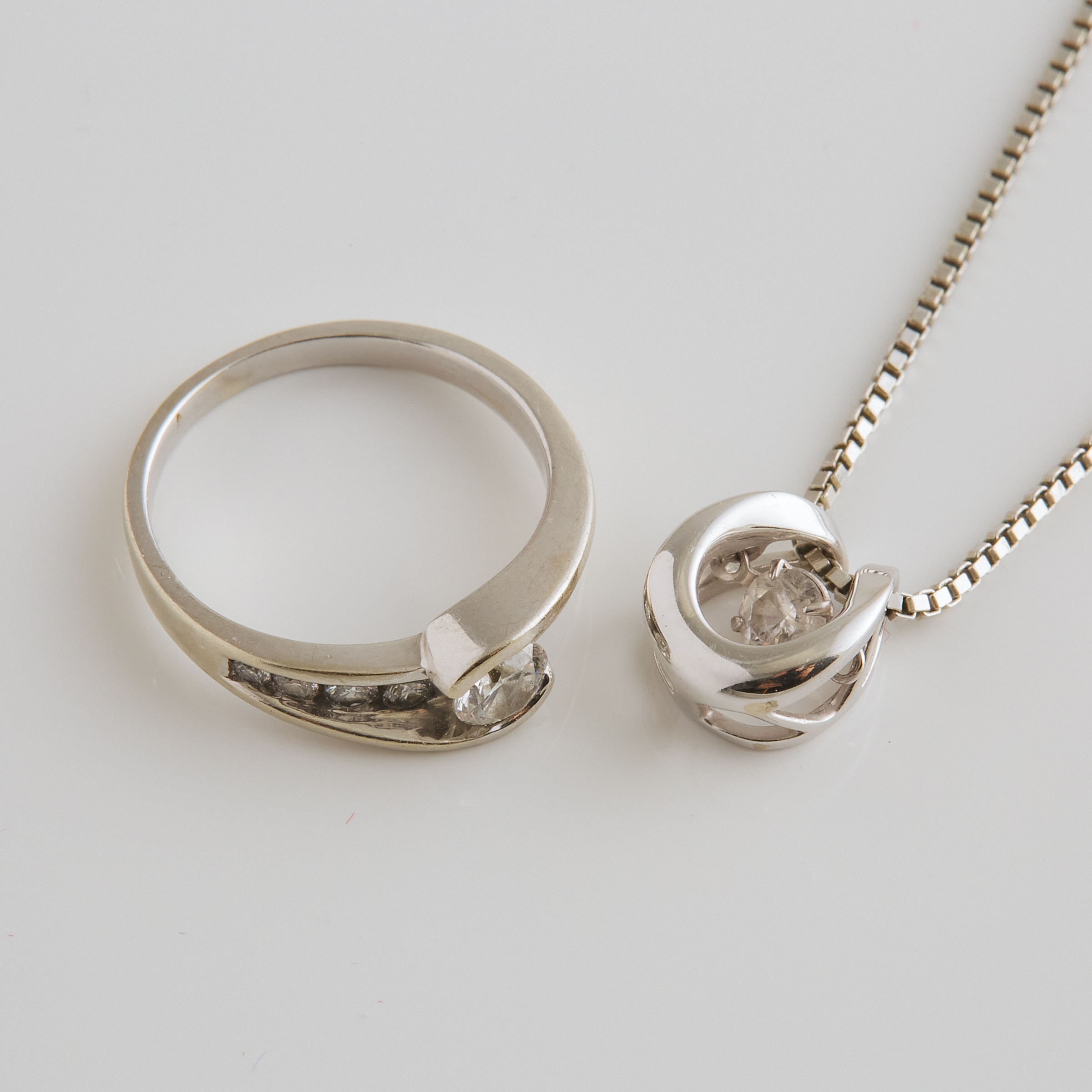14k White Gold Ring And A 10k White Gold Pendant 