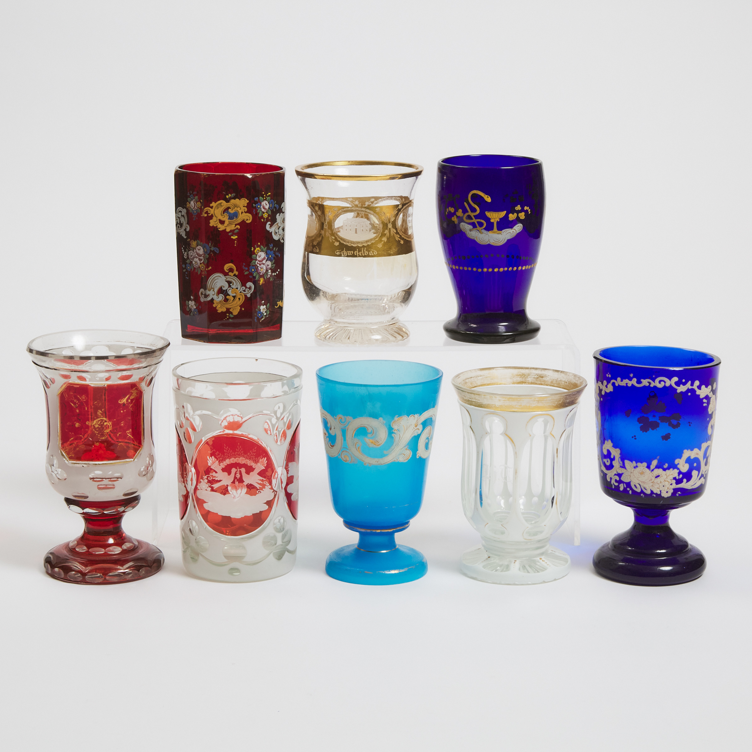 Eight Bohemian Overlaid, Enameled and Gilt Glass Goblets, mid-late 19th century
