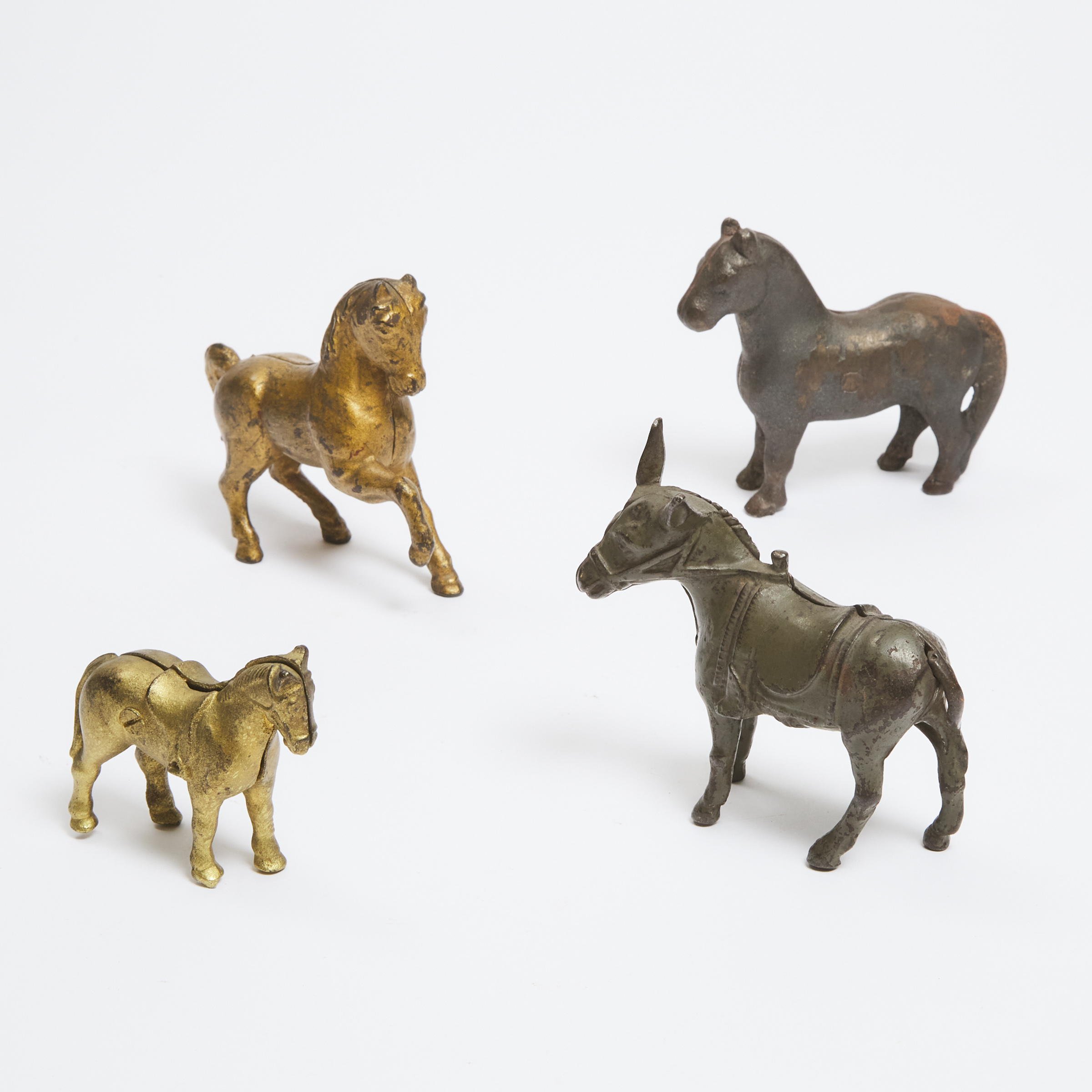 Four Equine Painted Cast Iron Still Banks, 19th century