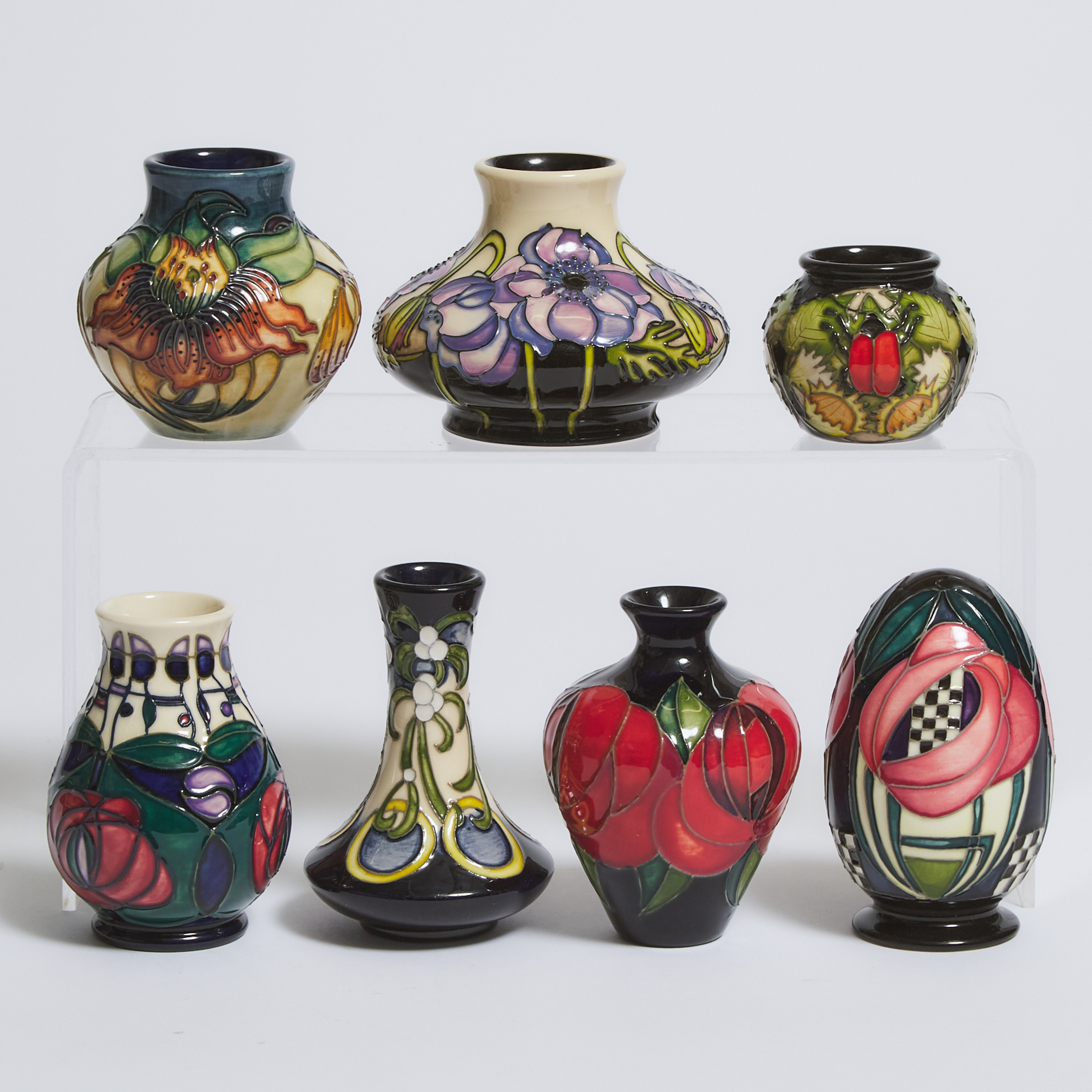 Six Moorcroft Small Vases and a Paperweight, late 20th/early 21st century