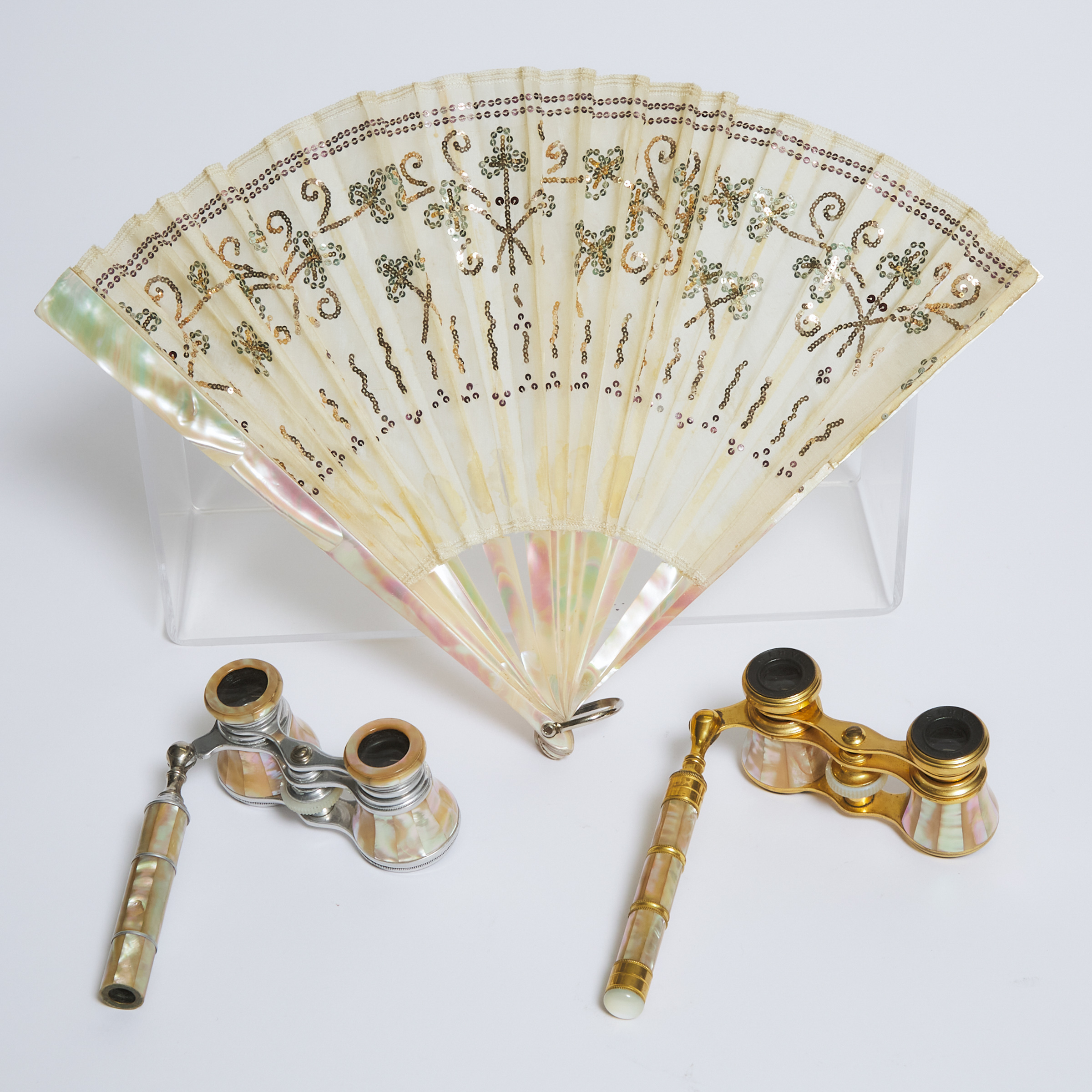 Two Pairs of French Opera Glasses and a Sequined Silk Hand Fan, late 19th/early 20th century