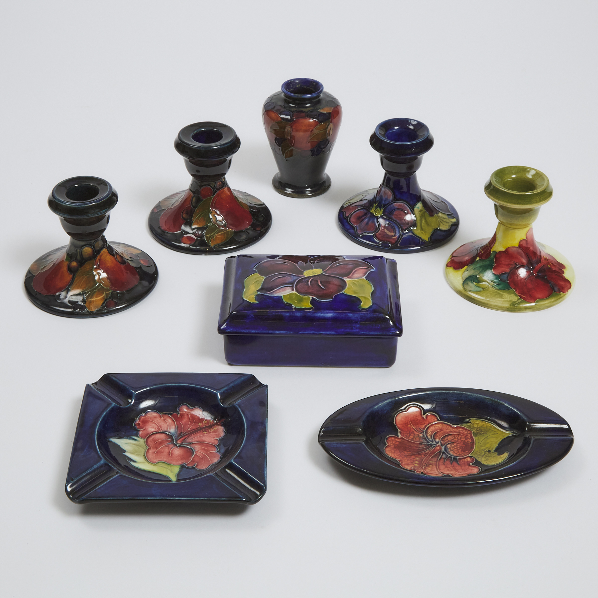 Group of Moorcroft Pomegranate, Hibiscus and Clematis Pottery, 20th century