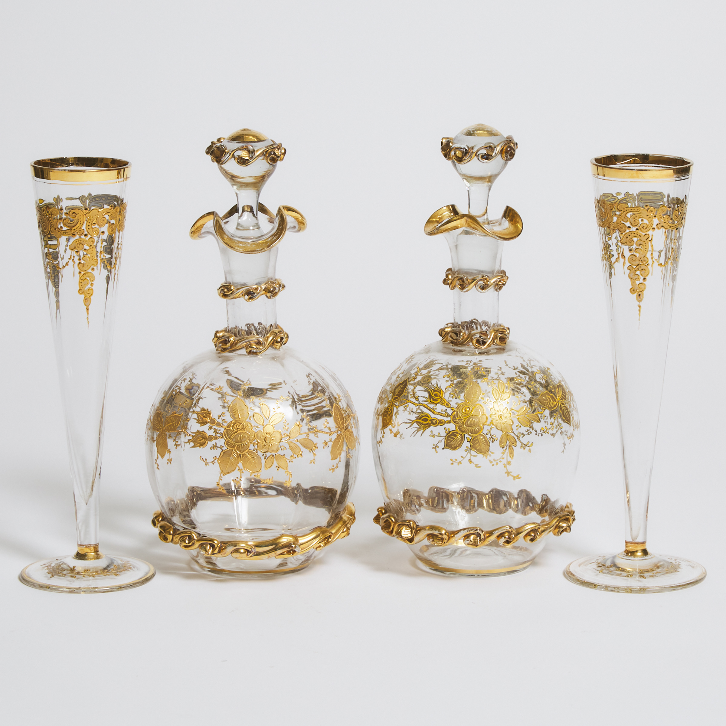 Pair of Continental Gilt Glass Decanters and Champagne Flutes, 20th century