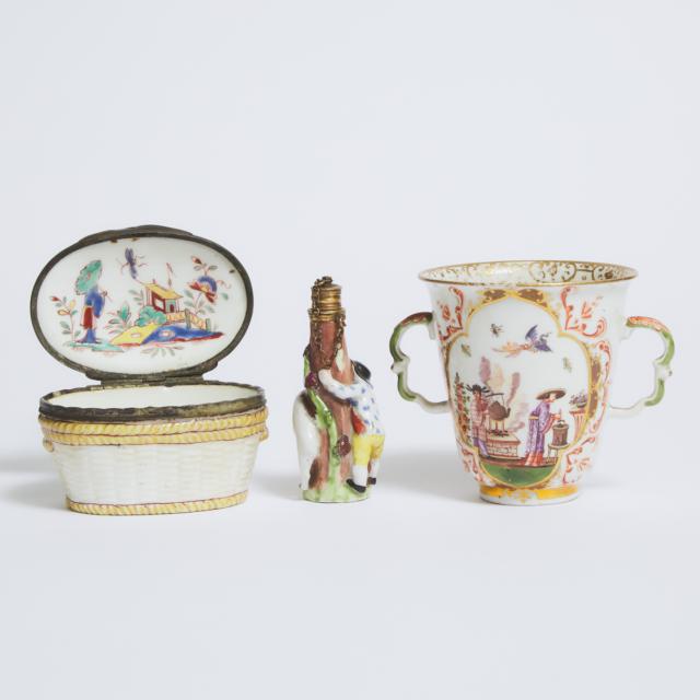 German Porcelain Chinoiserie Trembleuse Cup, French Boy and Goat Perfume Bottle, and a Moulded Oval Box, 18th/19th century