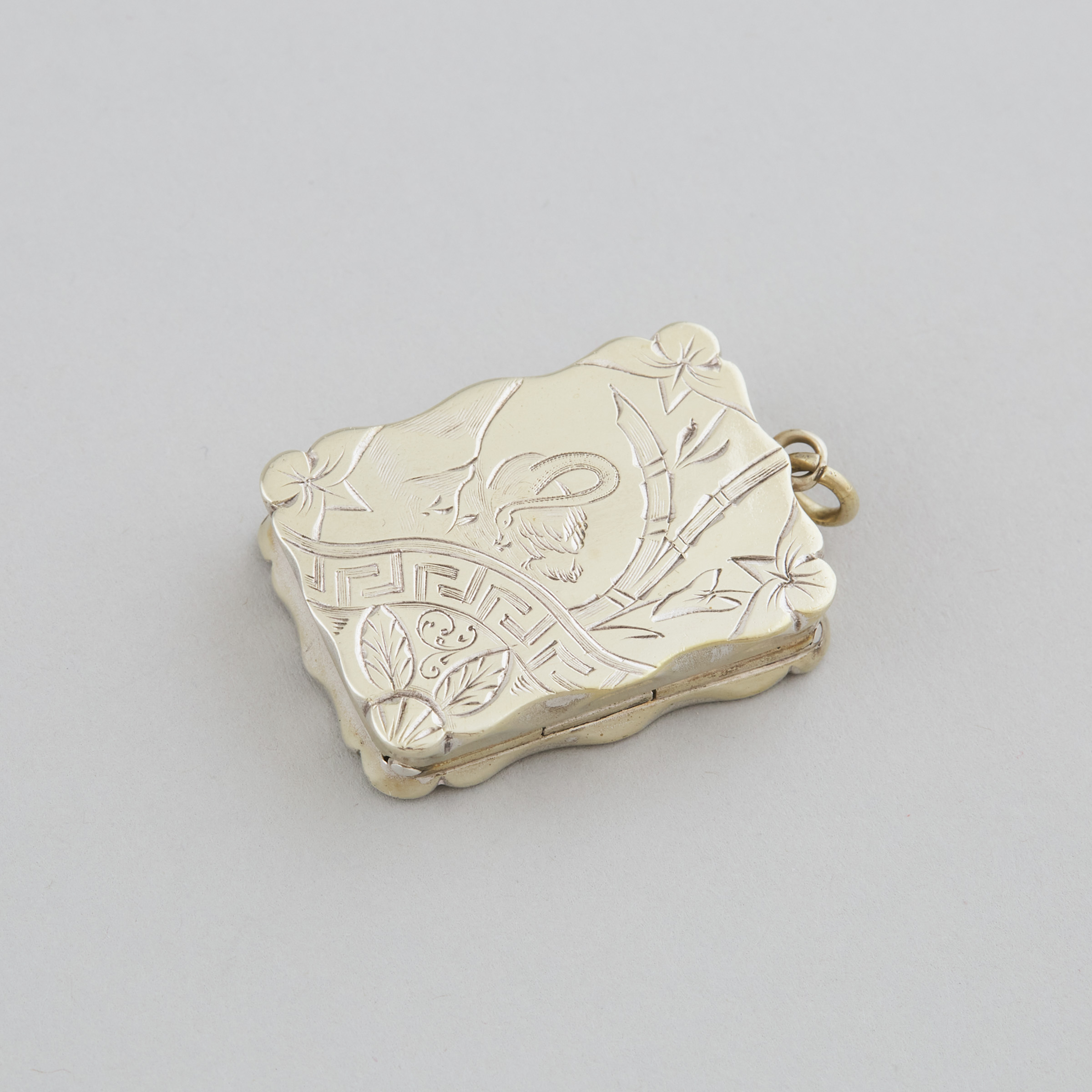Engraved Silver-Gilt Shaped Rectangular Vinaigrette, possibly Chinese Export or Japanese, 1880s