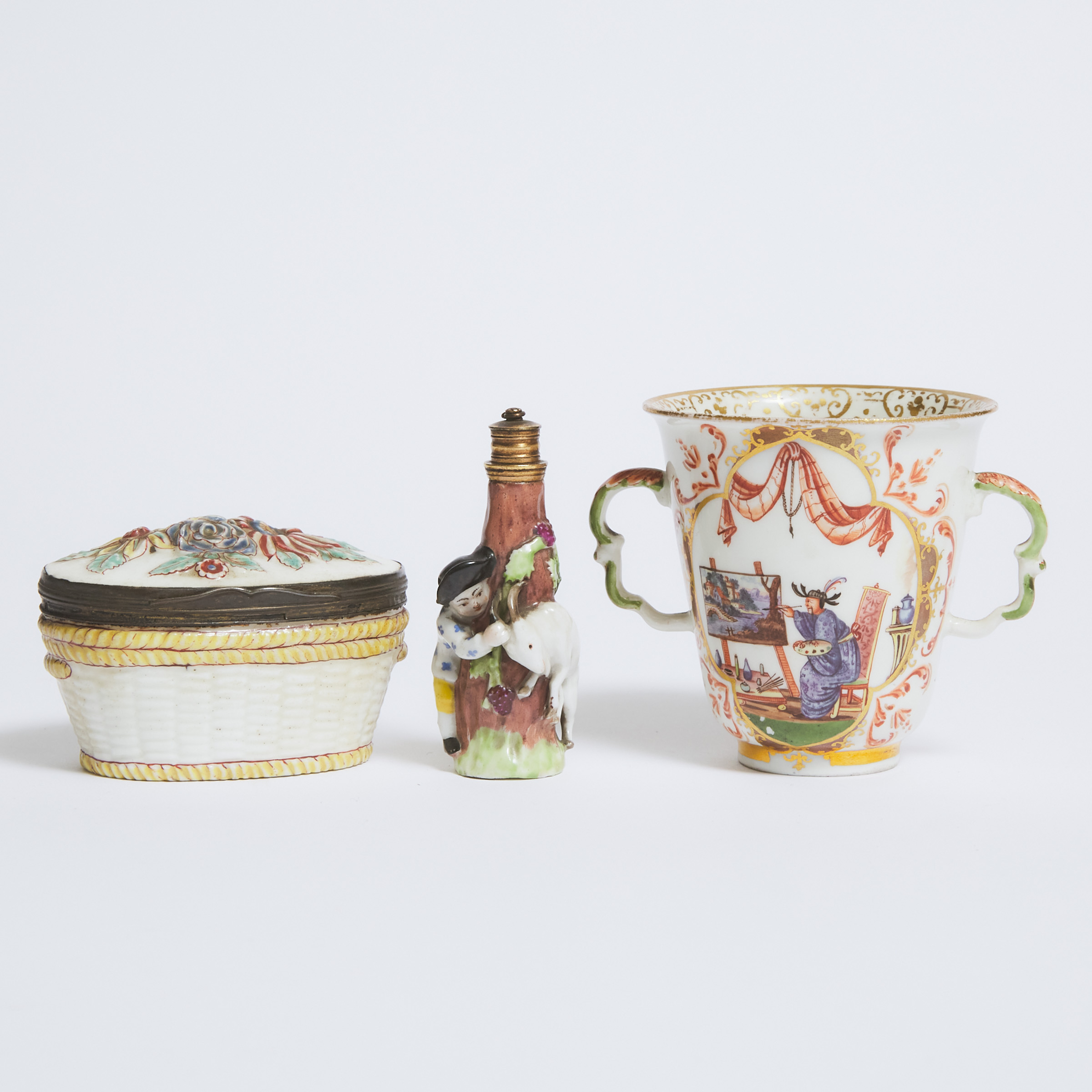 German Porcelain Chinoiserie Trembleuse Cup, French Boy and Goat Perfume Bottle, and a Moulded Oval Box, 18th/19th century
