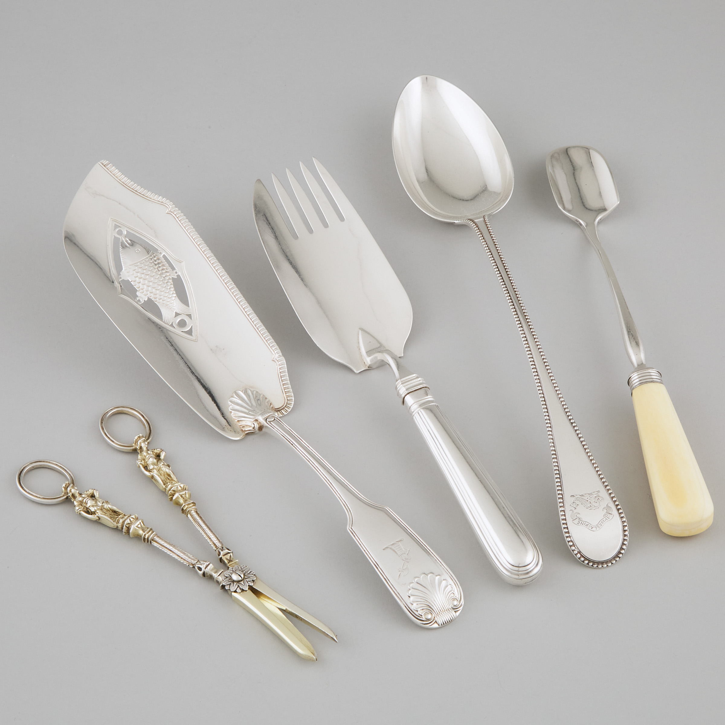 Two Georgian Silver Fish Slices, Victorian Silver-Gilt Grape Shears, Serving Spoon and a Stilton Scoop, c.1814-76