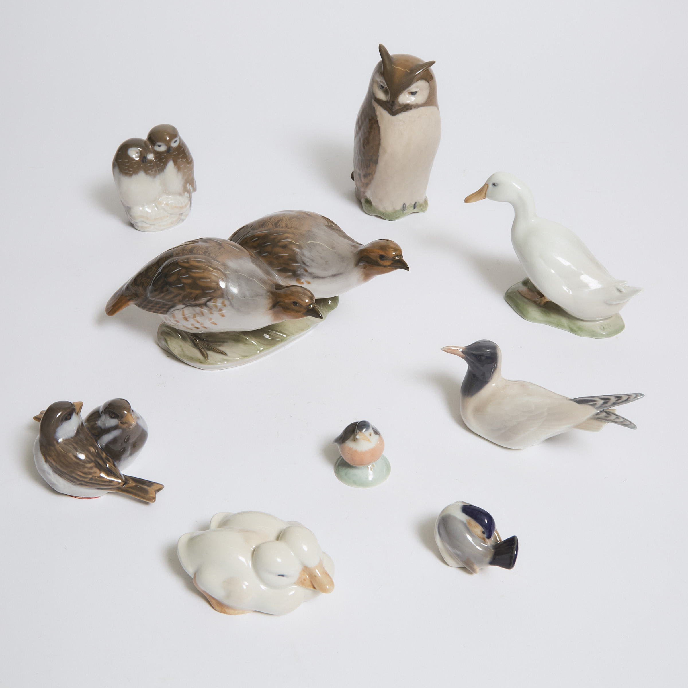 Nine Various Royal Copenhagen Bird Models and Groups, 20th century