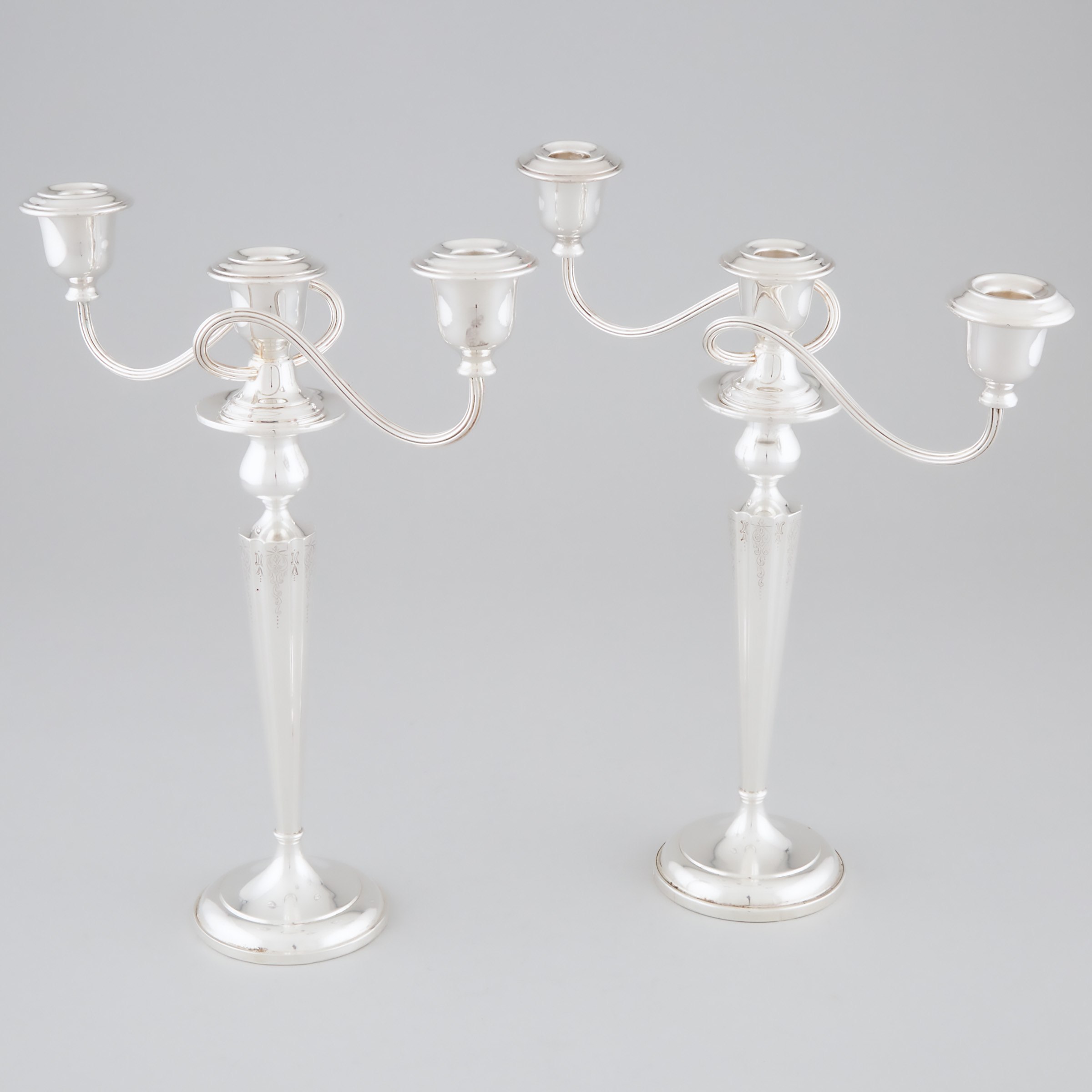 Pair of American Silver Candlesticks Together with a Pair of Three-Light Branches, 20th century