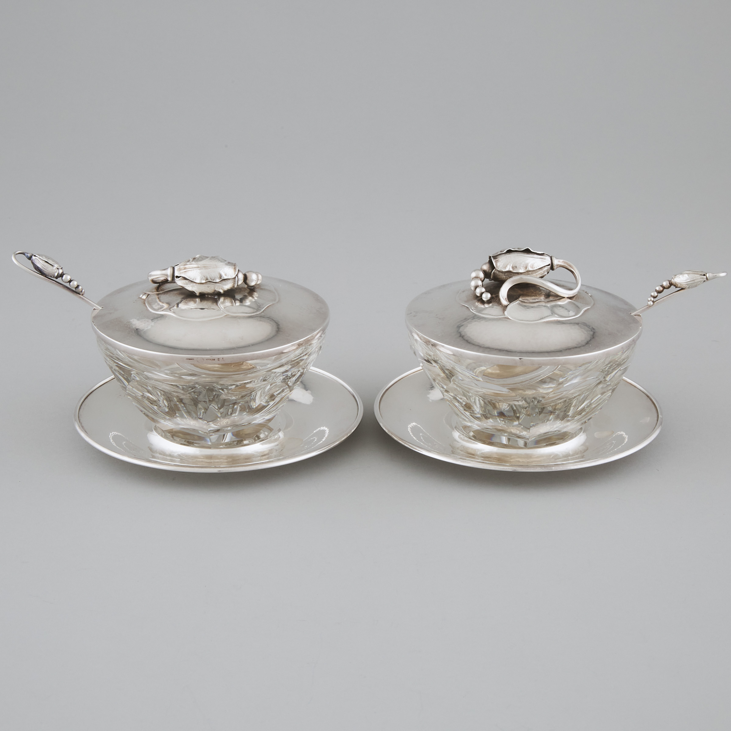 Pair of Danish Silver and Baccarat Cut Glass 'Blossom' Pattern Covered Preserve Jars with Stands and Spoons, #2A and #84, Georg Jensen, Copenhagen, post-1945