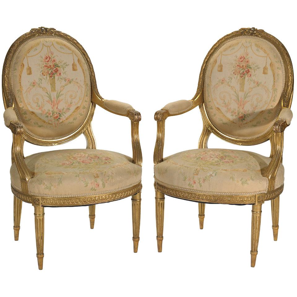 Pair of Carved Giltwood Open Armchairs  