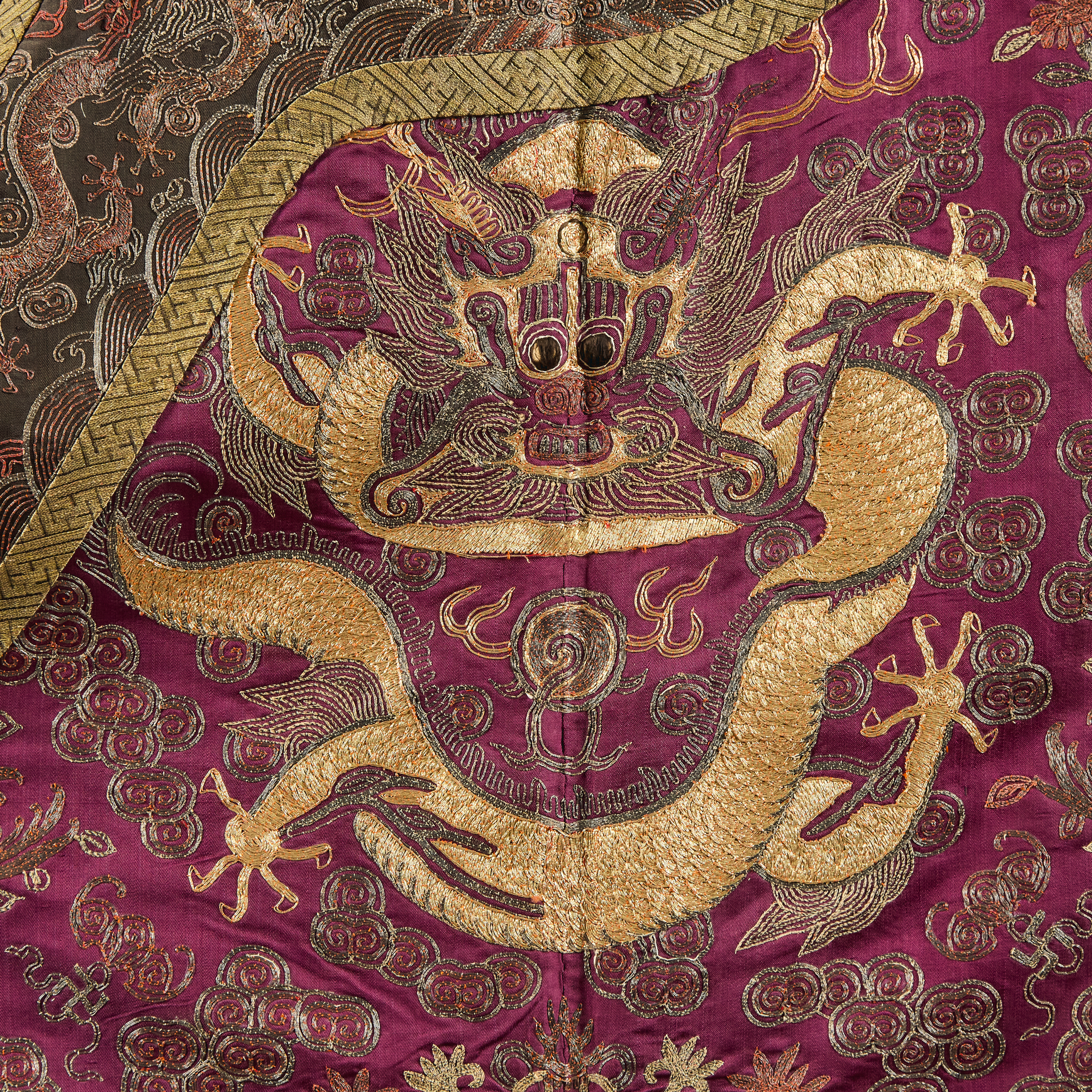 A Gold-Thread Embroidered Purple-Ground Dragon Robe, Guangxu Period (1875-1908)