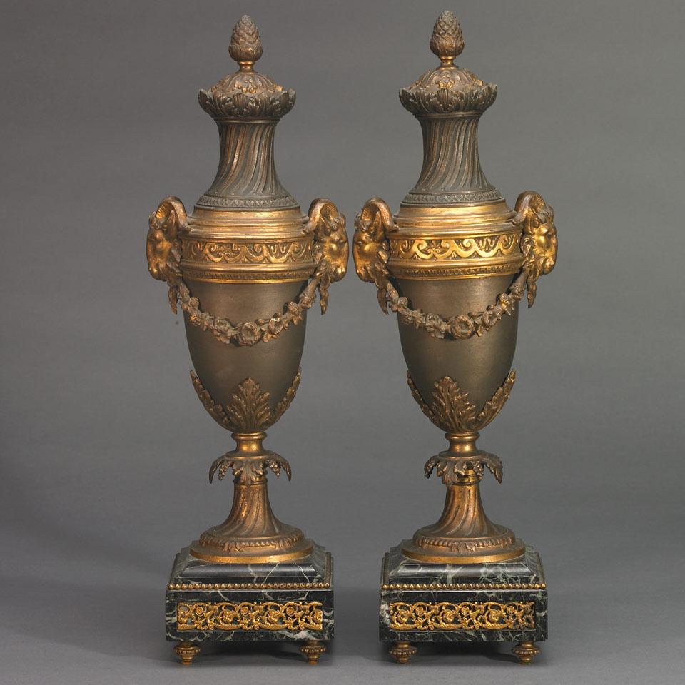 Pair of French Patinated and Gilt Bronze Mantel Urns, 19th century