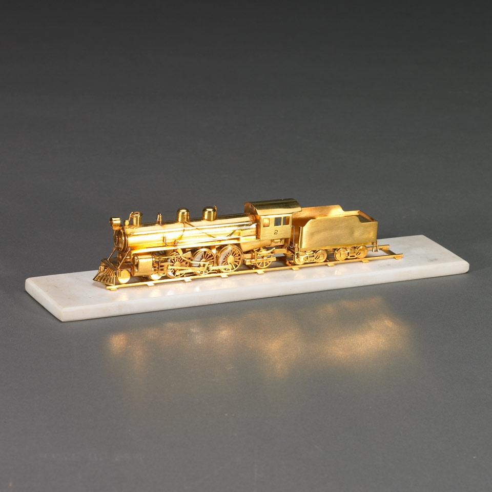 18k Yellow Gold Model of a Steam Locomotive with Tender, 20th century
