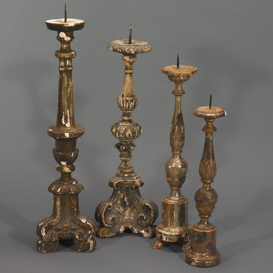 Group of Four Italian Turned and Carved Giltwood Prickets, 19th century