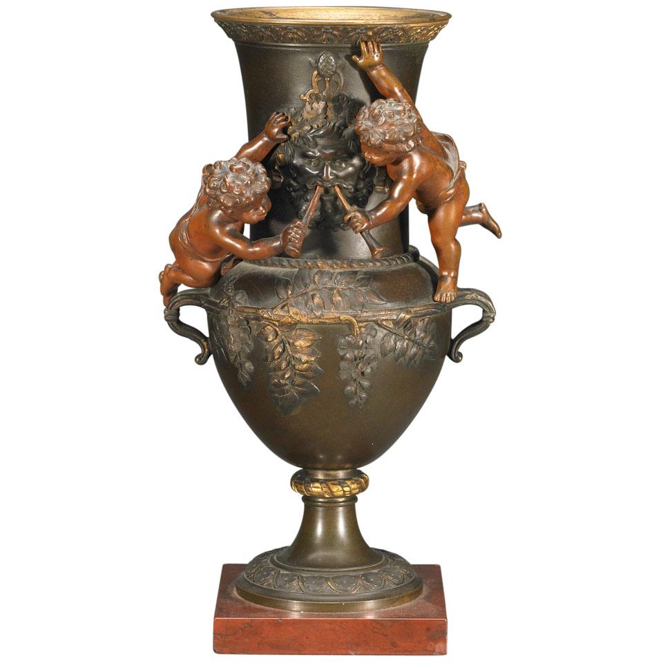 French Parcel Gilt and Patinated Bronze Mantel Urn on Rouge Griotte Marble Base, 19th century