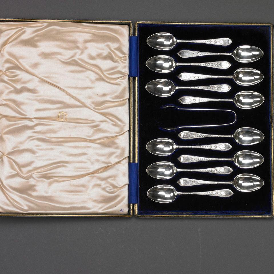 Twelve English Engraved Silver Coffee Spoons and Sugar Tongs, George Jackson & David Landsborough, London, 1911