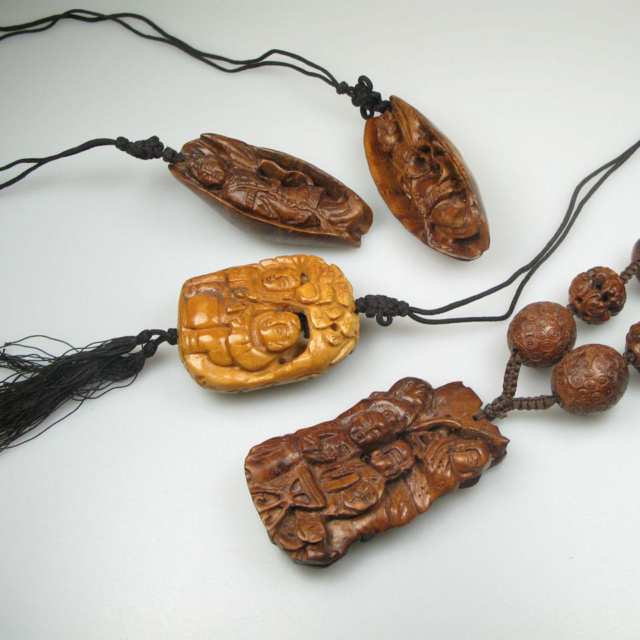 4 Carved Wood Pendants