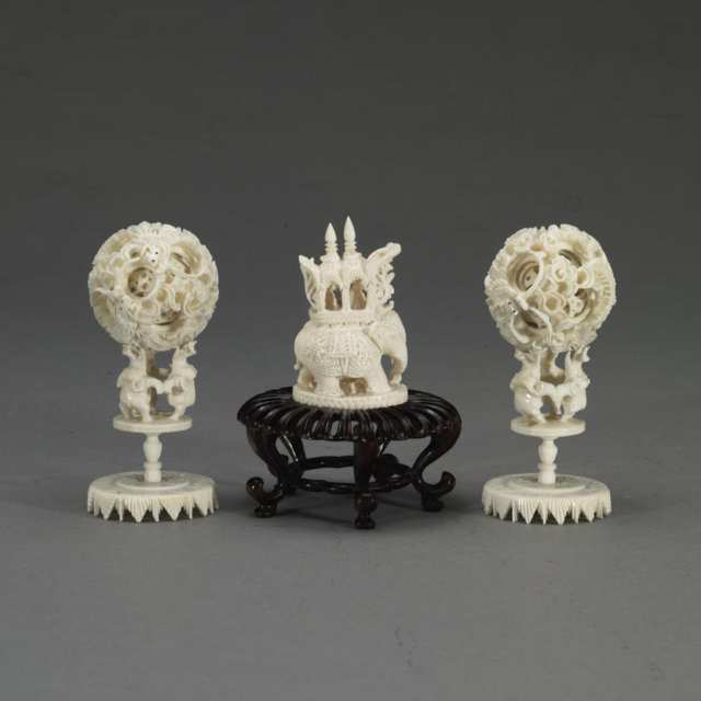 Pair of Ivory Stands with Puzzle Balls