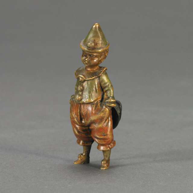 Small Austrian Cold Painted Bronze Novelty Figure of a Young Boy Dressed as a Clown, Peeing, c.1900