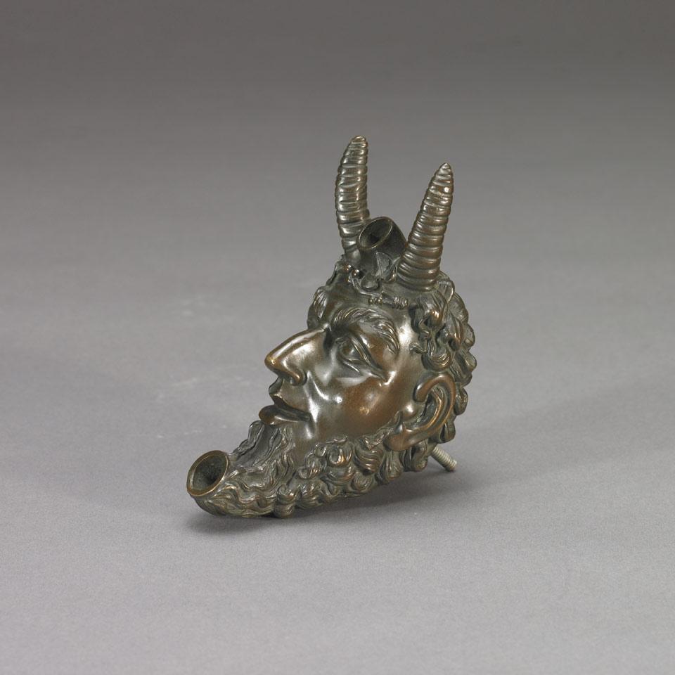 After the Ancient, Small Grand Tour Bronze Double Oil Lamp, Modelled as Mask of Satyr, 19th century