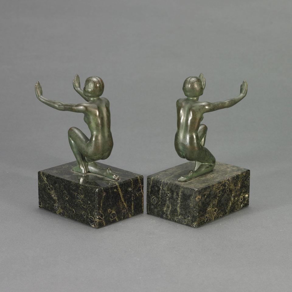 Pair of Art Deco Style Patinated Bronze Figural Nude Book Ends, late 20th century