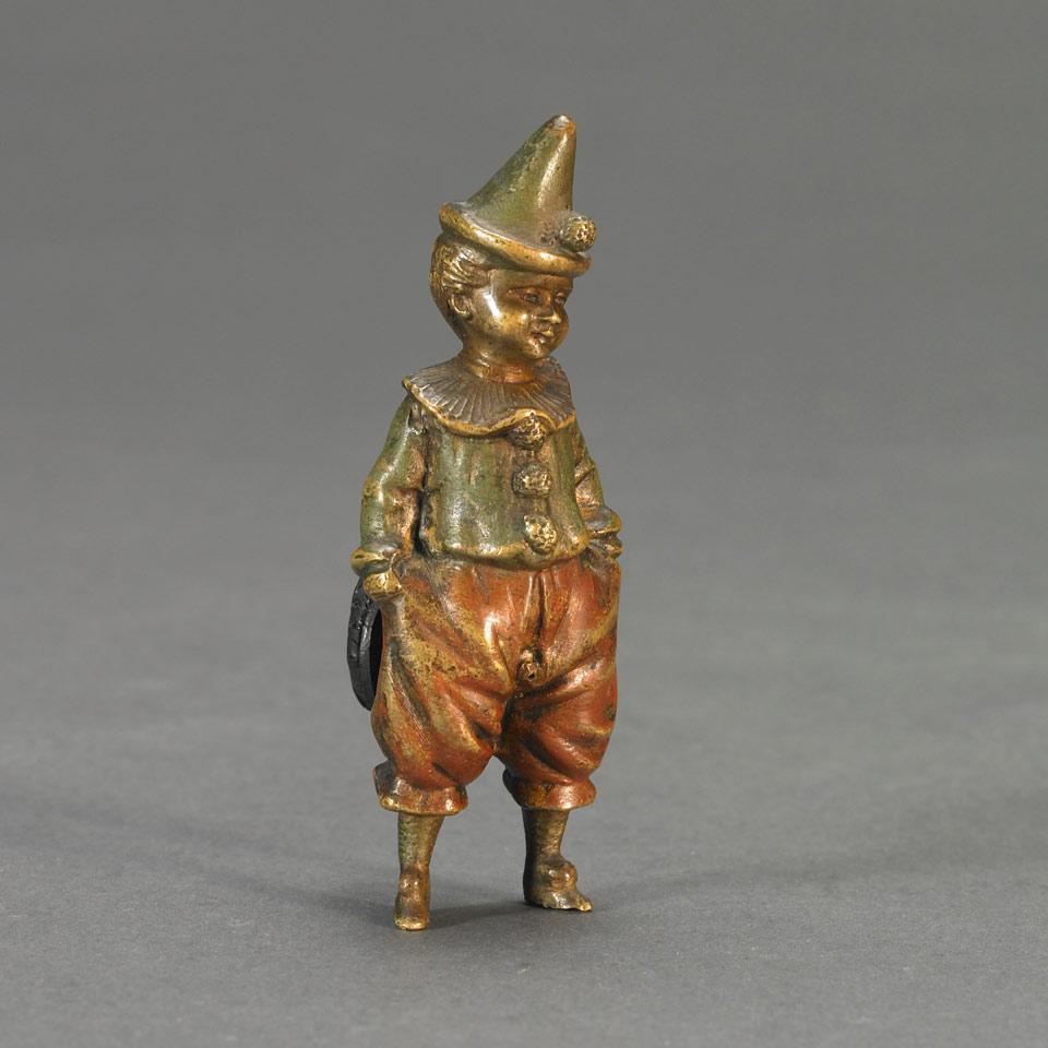 Small Austrian Cold Painted Bronze Novelty Figure of a Young Boy Dressed as a Clown, Peeing, c.1900