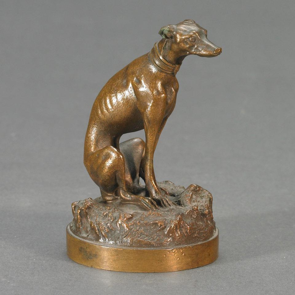 Small French School Patinated Bronze Figure of a  Whippet Seated on a Naturalistic Base, 19th century