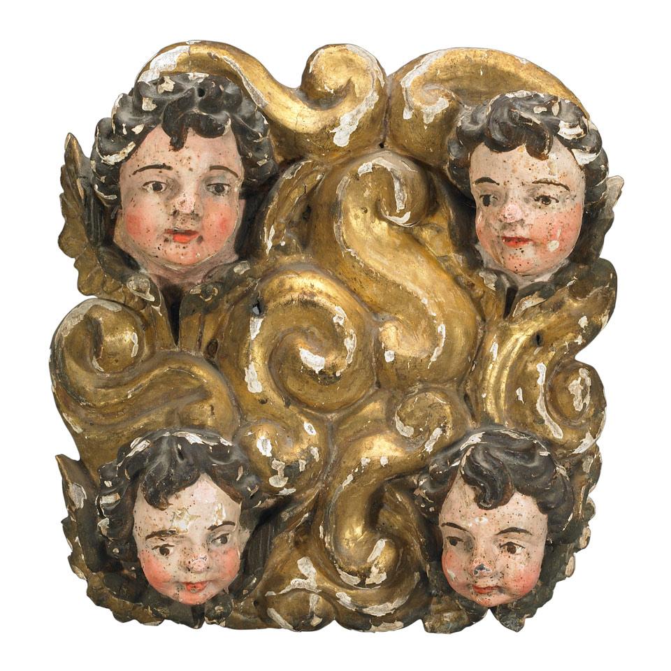 Italian Carved , Polychromed and Gilt Plaque, Four Putti Amongst Clouds, early 20th Century 