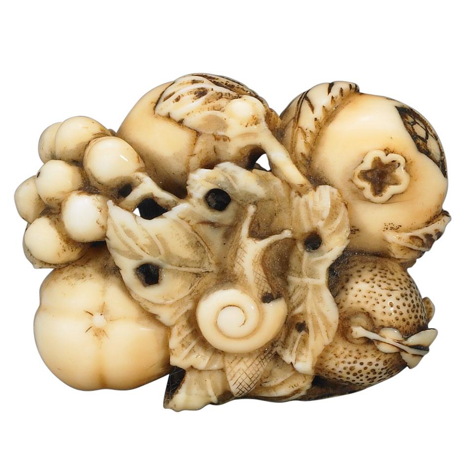 Ivory Netsuke of a Fruit Cluster and Snail, Edo Period, 19th Century