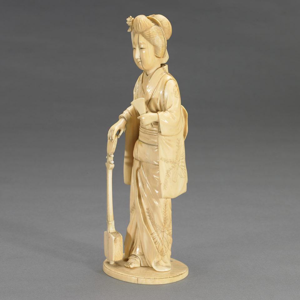 Ivory Okimono of a Woman Sangen Player, Meiji Period, Late 19th Century 