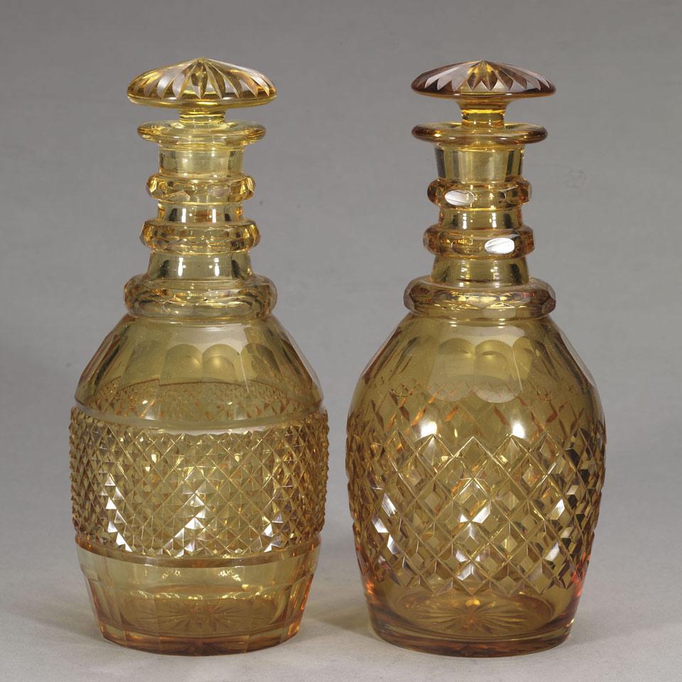 Two Late Georgian Cut Amber Glass Decanters, early 19th century