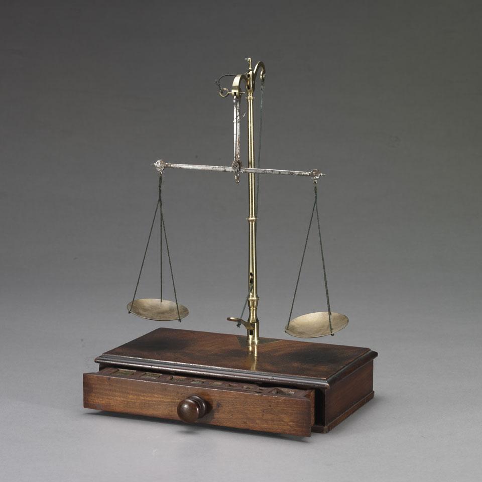 English Flame Mahogany, Laquered Brass and Iron Travelling Beam Balance, mid 19th century