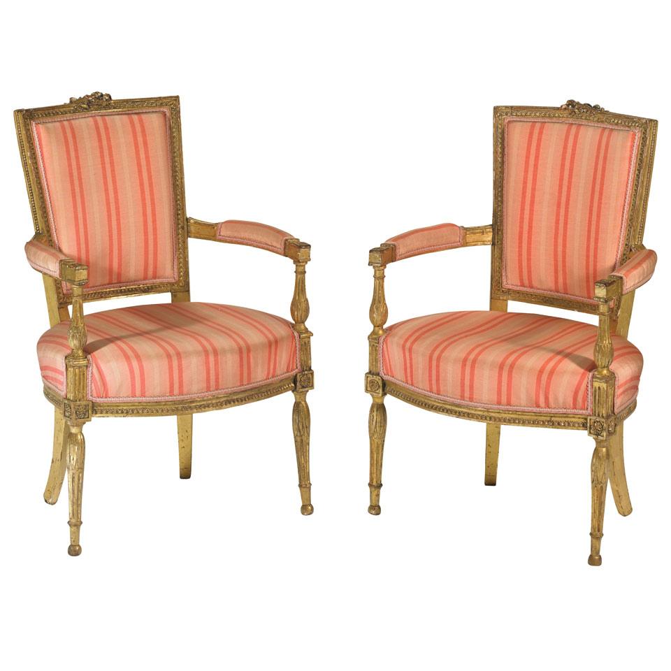 Pair of Carved and Gilded Open Armchairs 