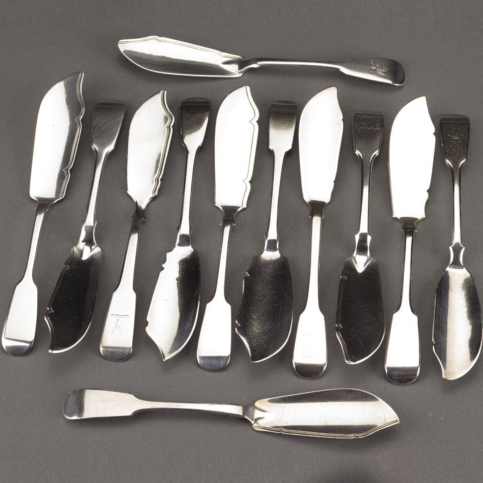 Twelve Georgian and Victorian Silver Fiddle Pattern Butter Knives, 19th century