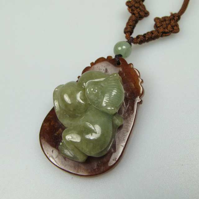Brown And Green Carved Jade “Cameo” Pendant