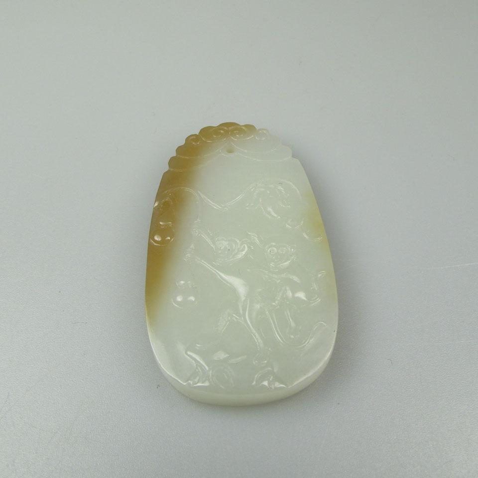 Oval Carved White To Brown Jadeite Pendant