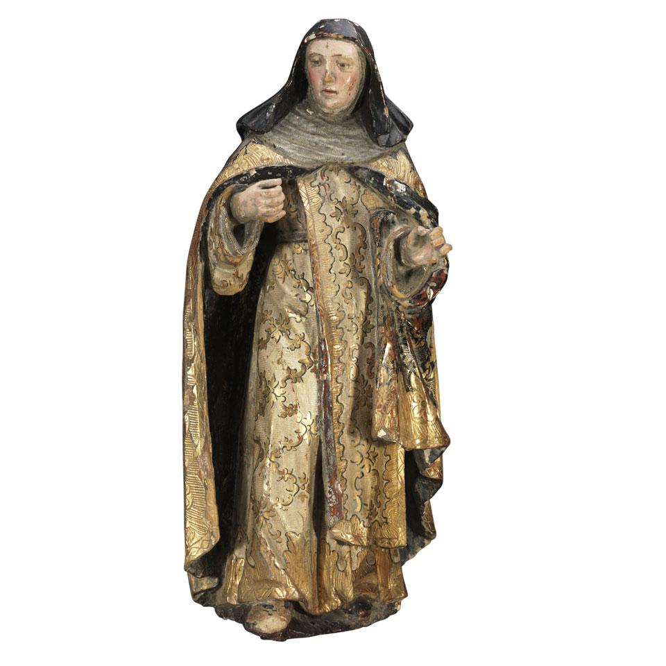 Spanish Carved, Polychromed and Parcel Gilt Figure of St. Theresa of Avila, early 19th century